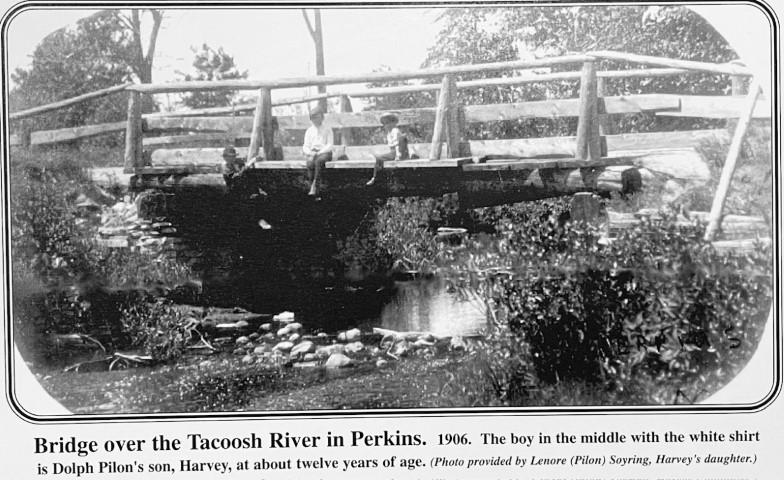 Bridge over the Tacoosh River in Perkins. 1906. The boy in the middle with the white shirt is Dolph Pilon's son, Harvey, at about twelve years of age. (Photo provided by Lenore (Pilon) Soyring, Harvey's daughter.)