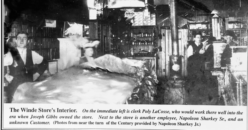 The Winde Store's Interior. On the immediate left is clerk Poly LaCosse, who would work there well into the era when Joseph Gibbs owned the store. Next to the stove is another employee, Napoleon Sharkey Sr., and an unknown Customer. (Photos from near the turn of the Century provided by Napoleon Sharkey Jr.)