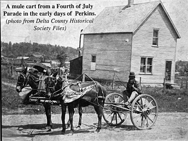 A mule cart from a Fourth of July Parade in the early days of Perkins. (Photo from Delta County Historical Society Files)